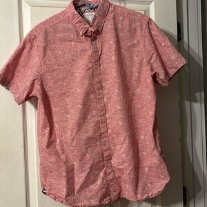 Men's Cactus Man, Ricky Singh short sleeve button down with palm tree pattern.